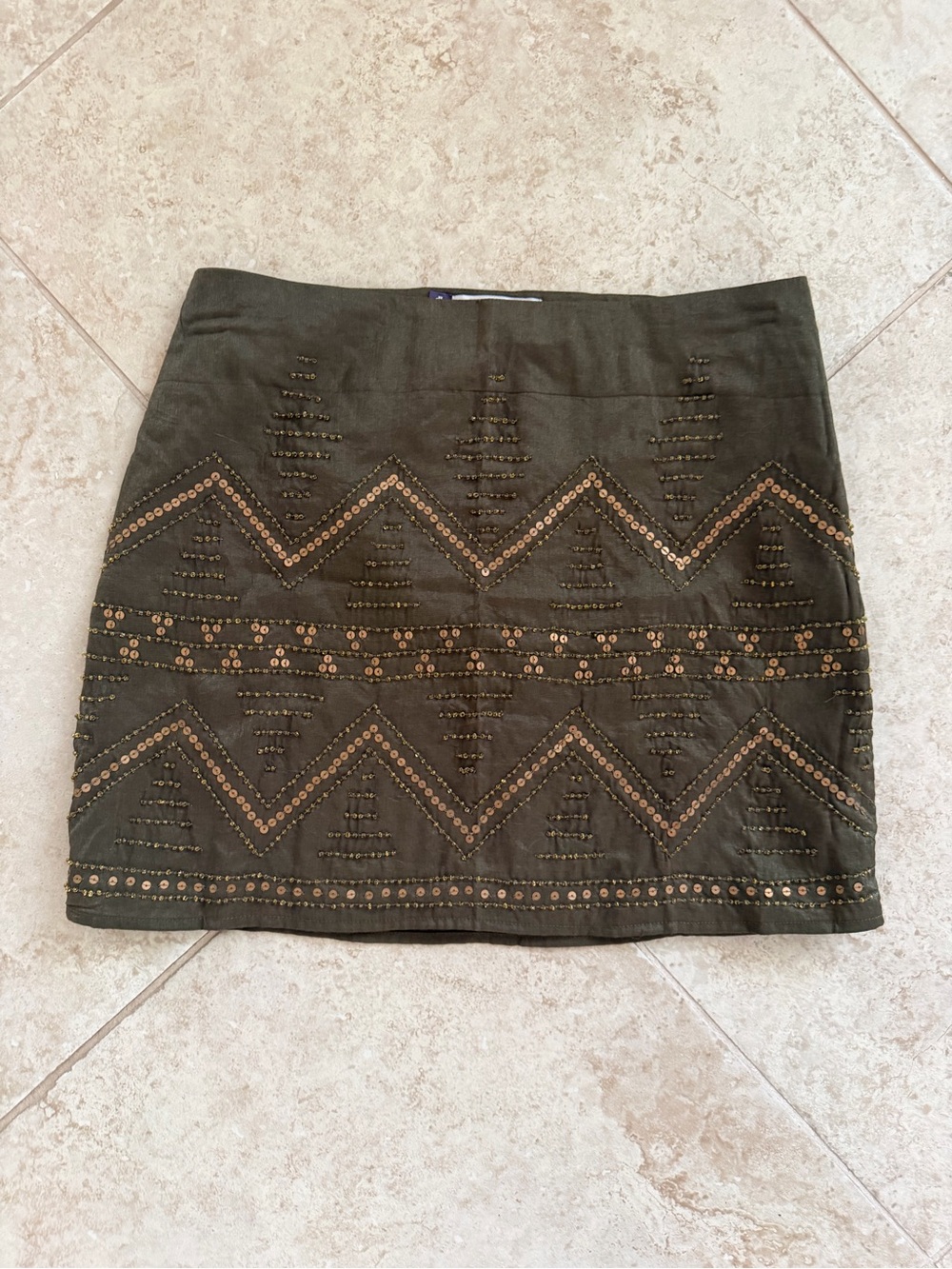 Jennifer Lopez Olive Green Mini Skirt with Bronze Embellishments